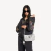 Dámská taška Rodeo Sling Pochette s kamínky v kouřově šedé barvě